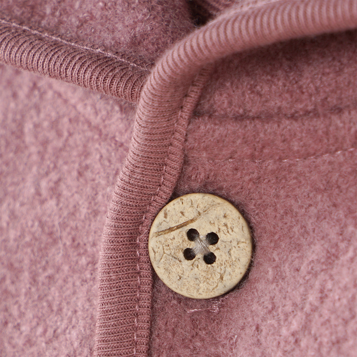 Wollen babyoverall met omgeslagen boorden