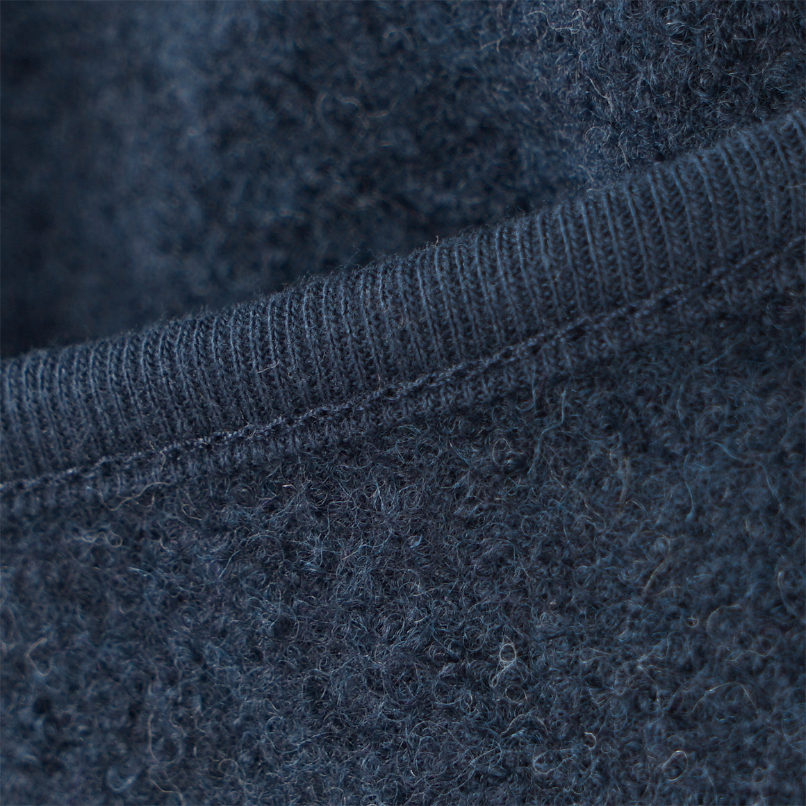 Wollen babyoverall met omgeslagen boorden