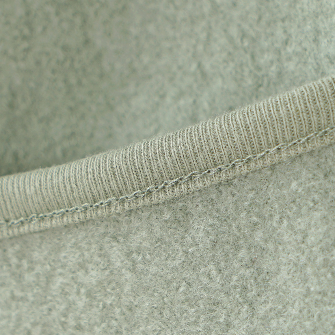 Wollen babyoverall met omgeslagen boorden