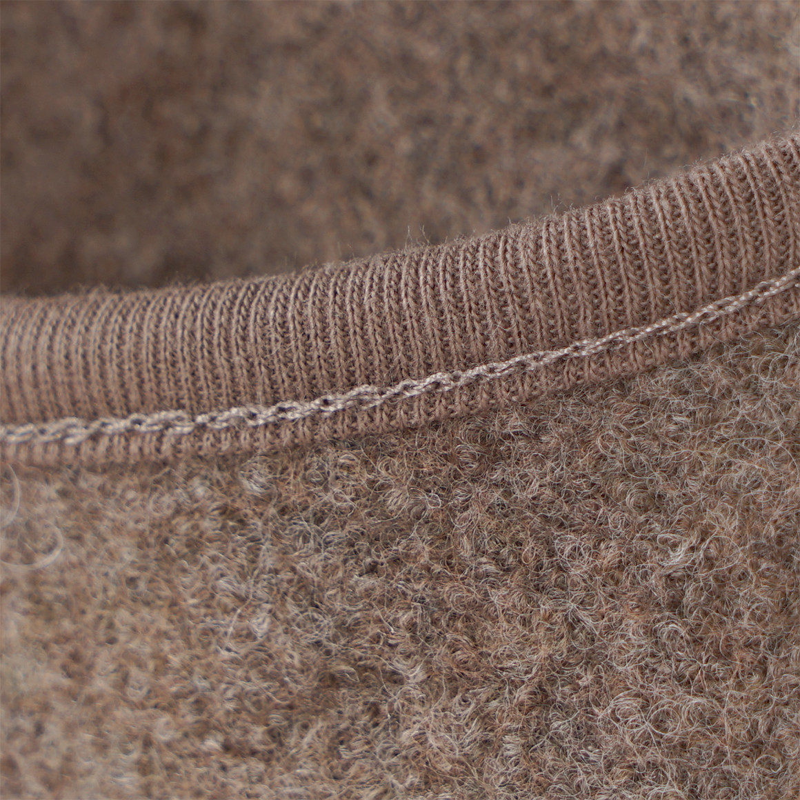 Wollen babyoverall met omgeslagen boorden