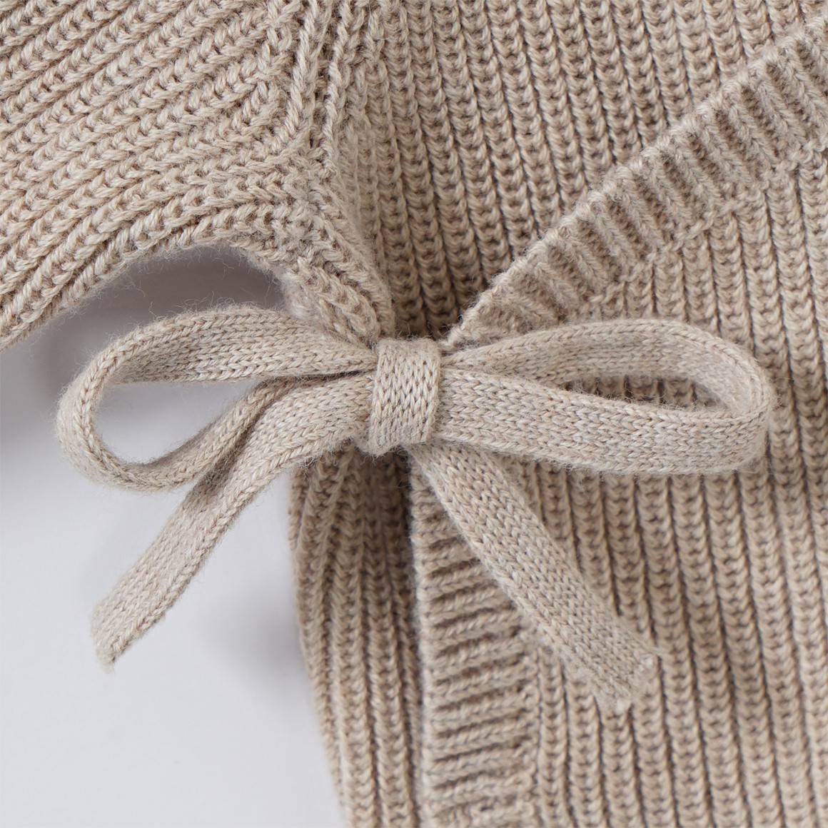 Baby wikkeljasje in ribbreisel