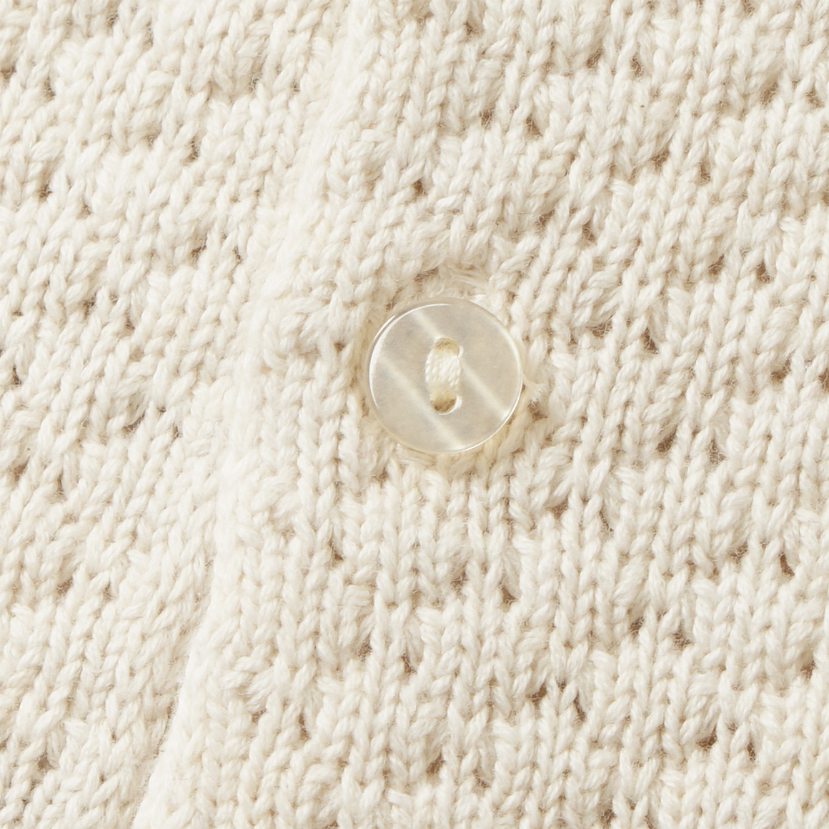 Gebreide babyjurk met dierenapplicatie