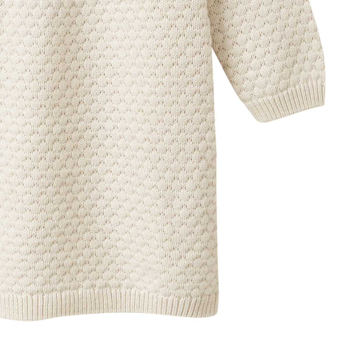 Gebreide babyjurk met dierenapplicatie