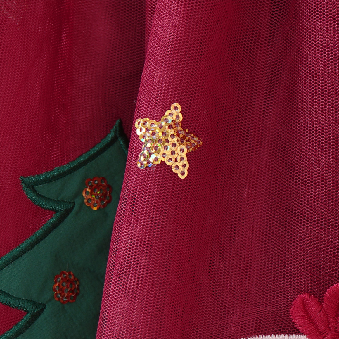 Meisjes kerstrok met applicaties