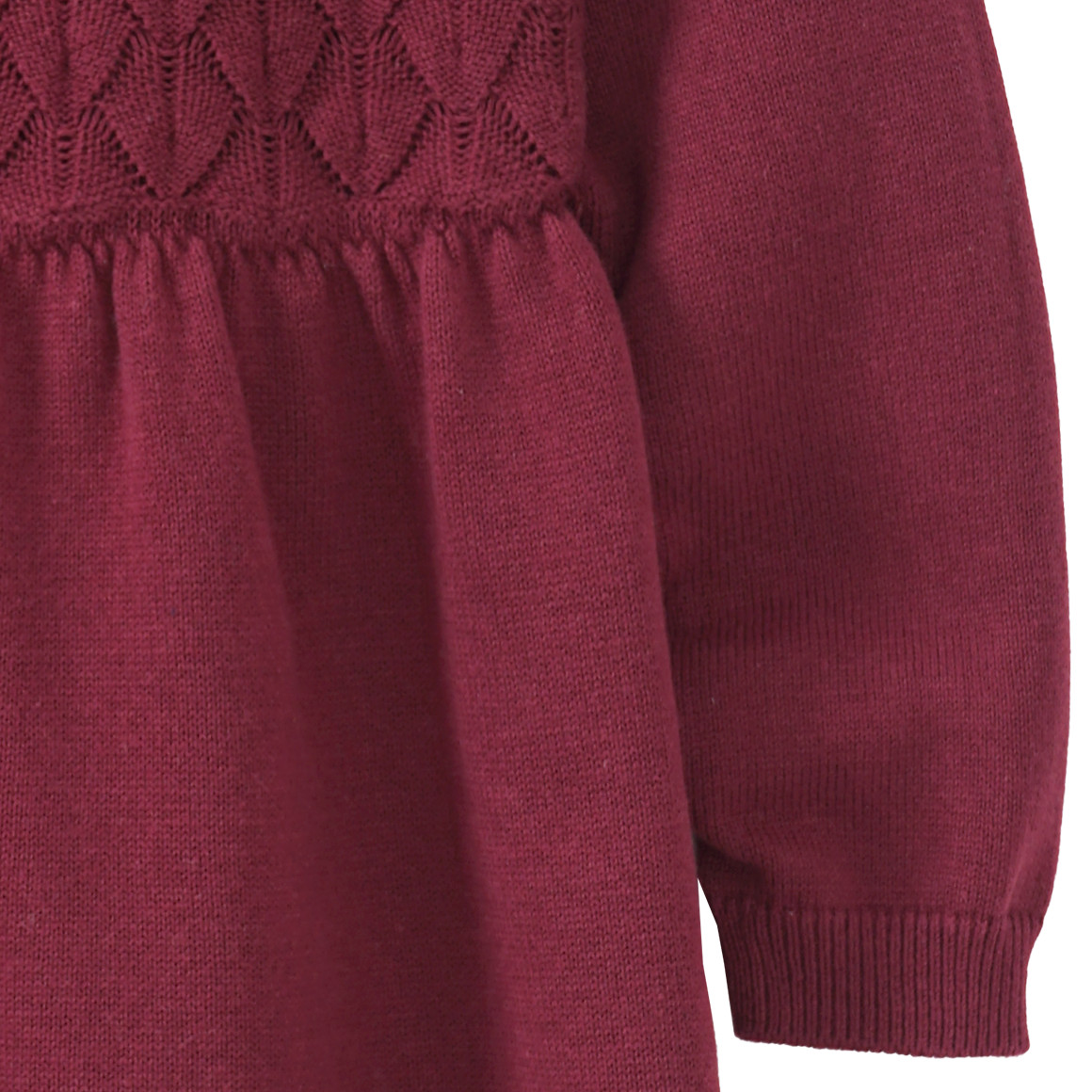 Gebreide meisjesjurk met honingraatstructuur