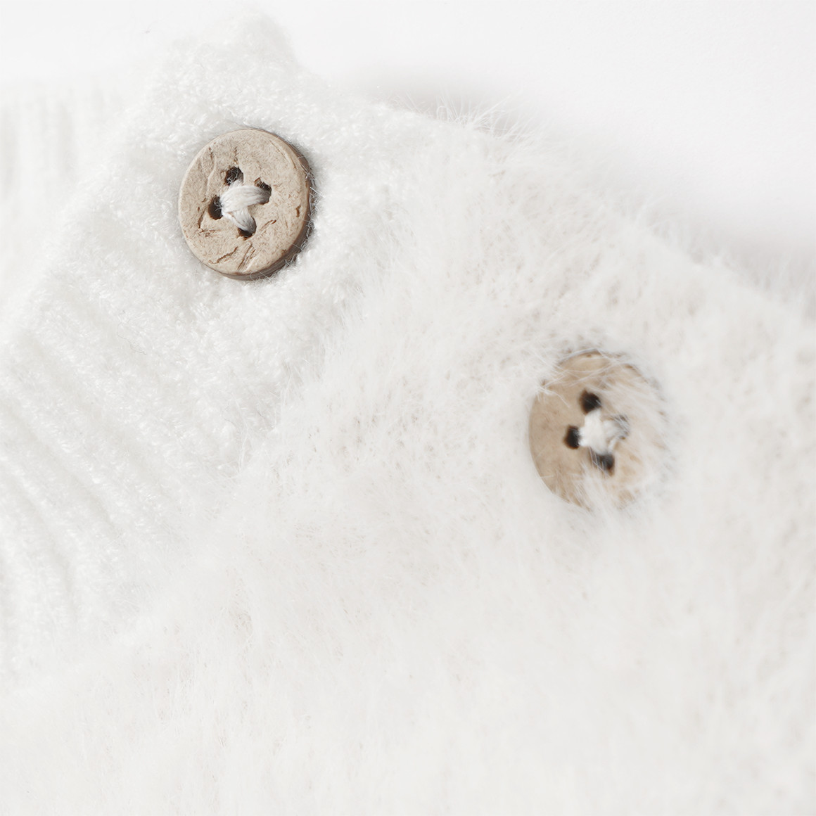 Gebreide trui voor baby’s met hartjes