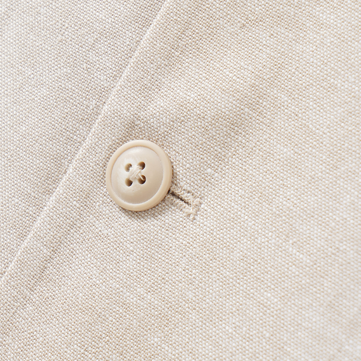 Linnen gekleed jongensvest met knopen