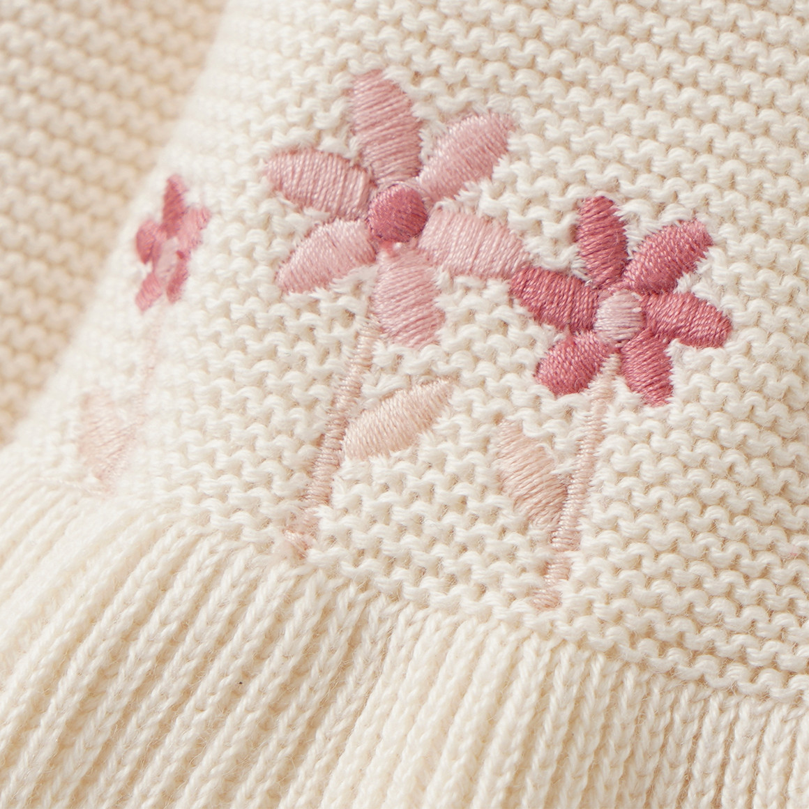 Babyvestje met bloemenborduursel