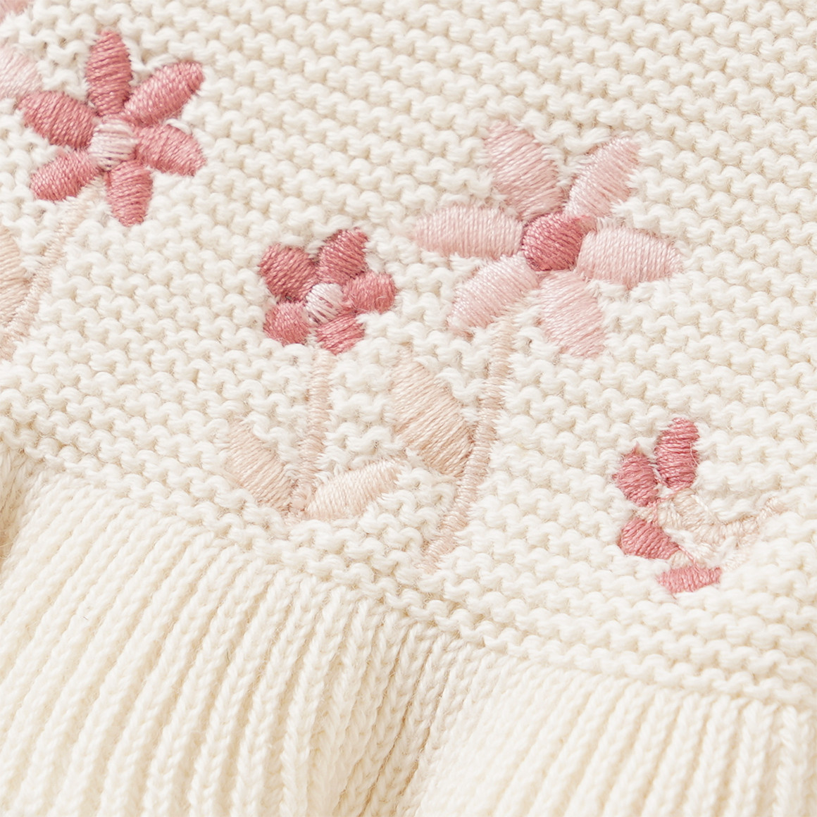 Newborn Strickjacke mit Applikation