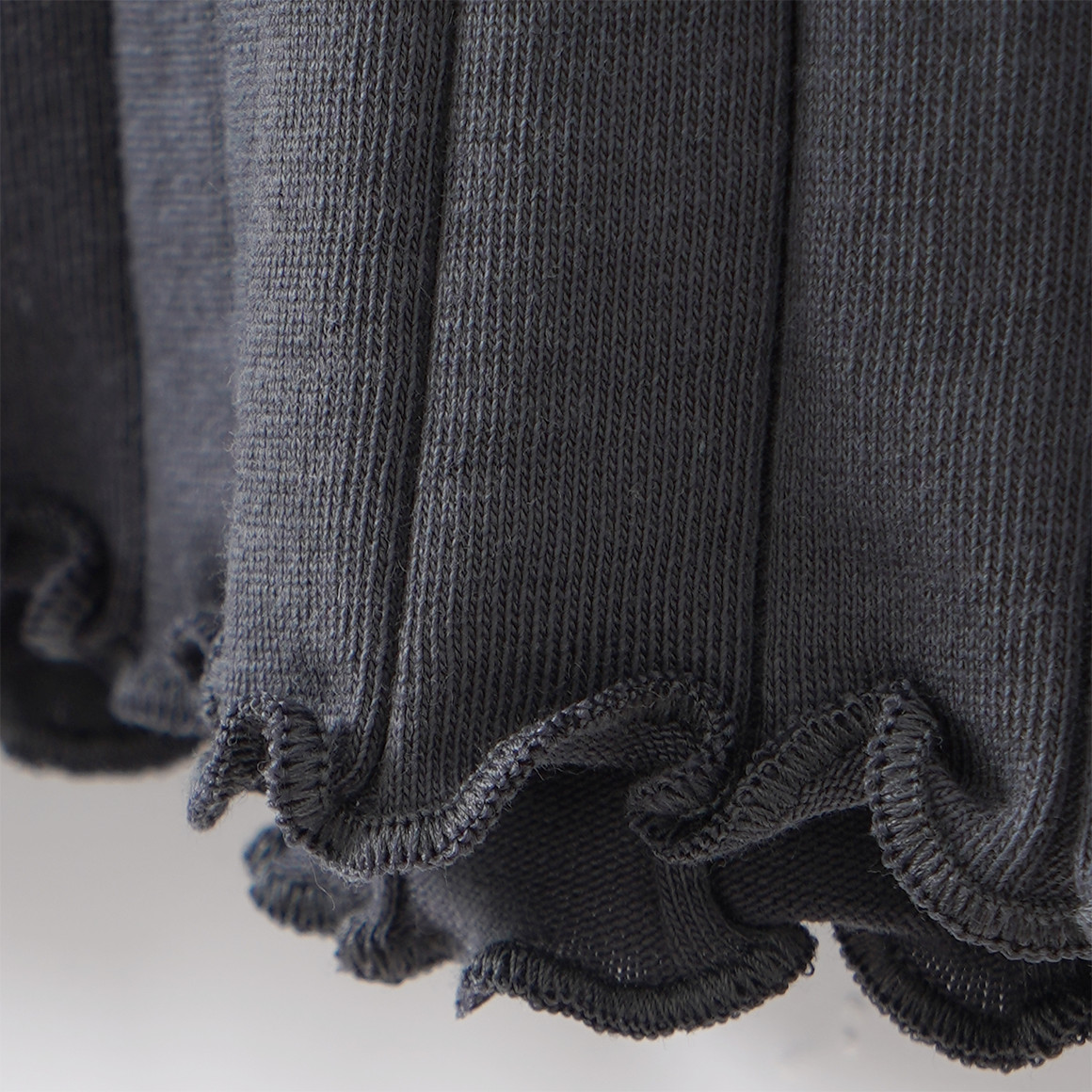 Meisjesshirt met lange mouw en golvende boord