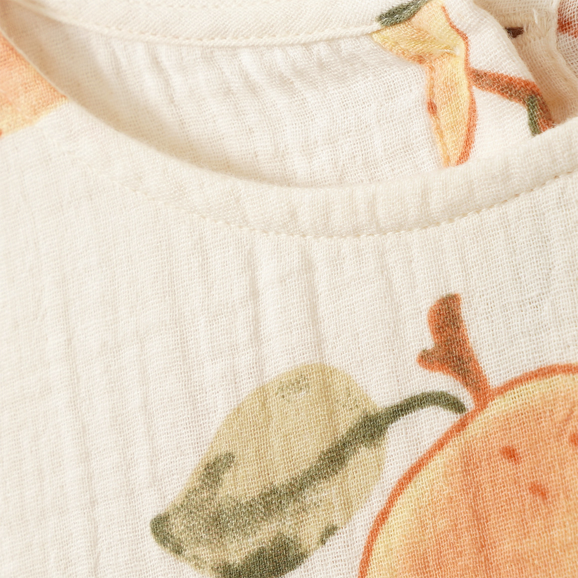 Meisjes mousseline jurk met oranje patroon