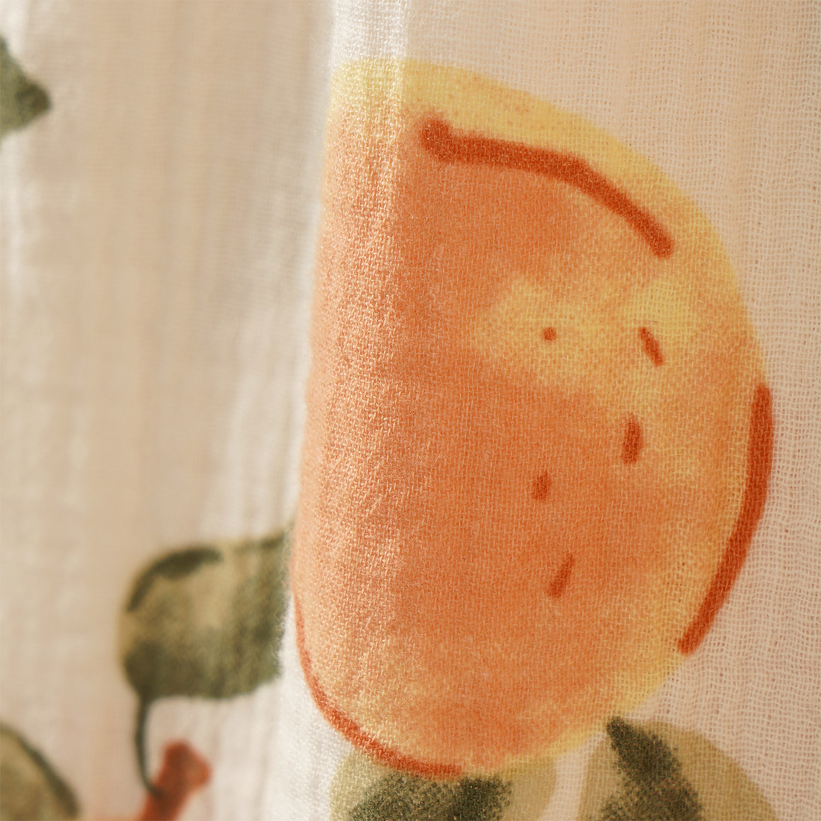 Meisjes mousseline jurk met oranje patroon