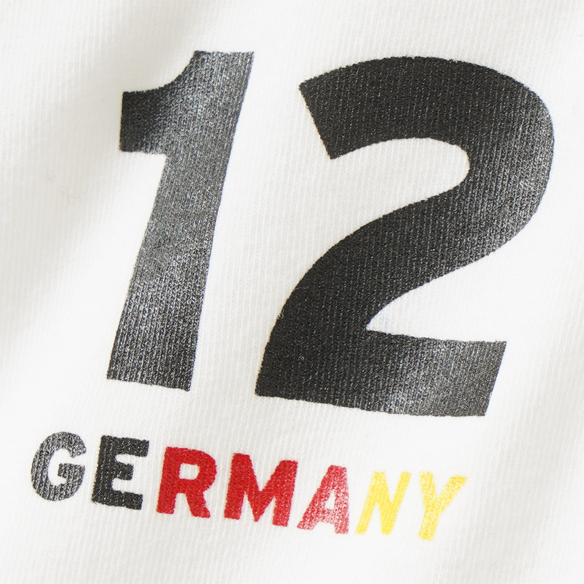 2 Baby Bodys im Fußball-Design