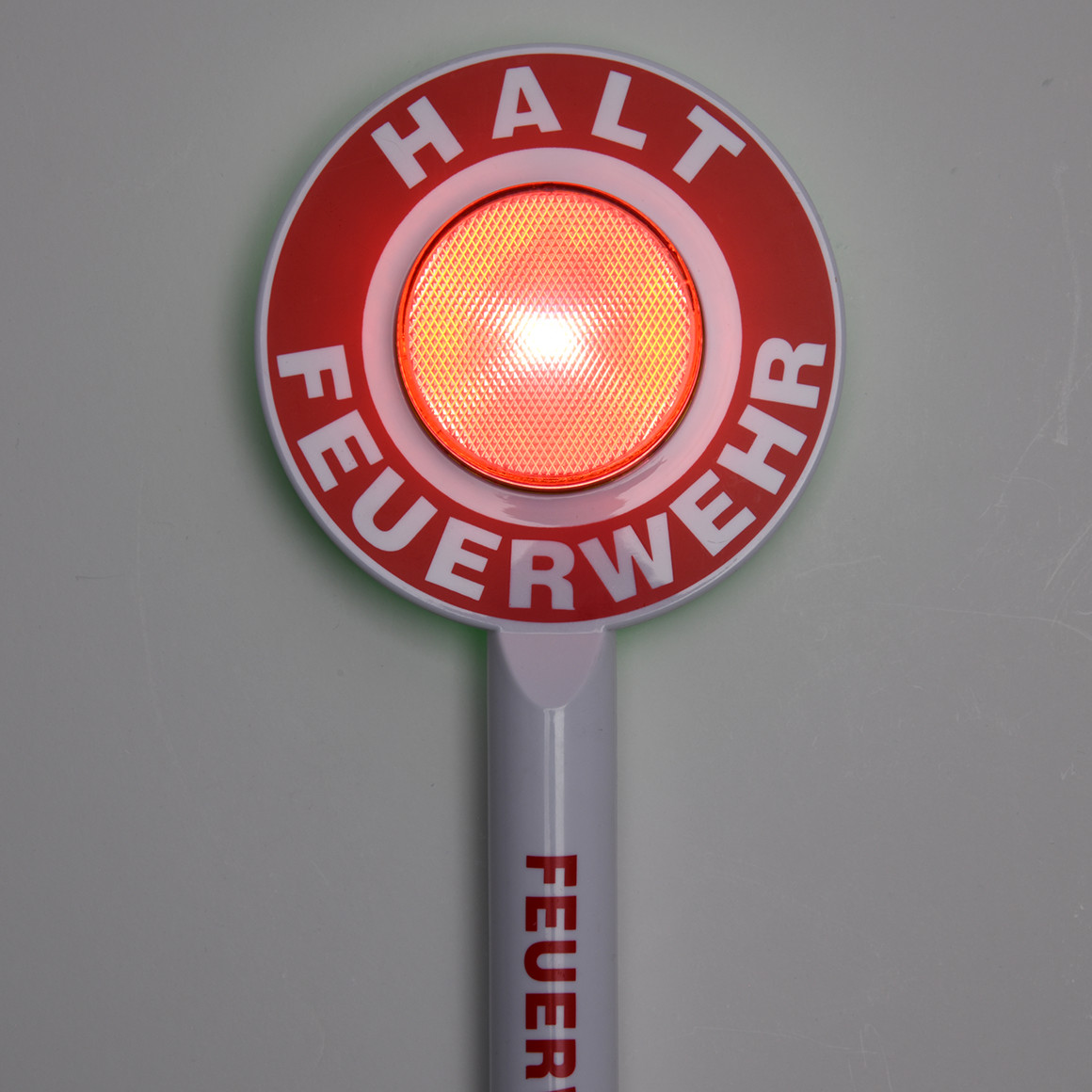 Feuerwehr-Kelle mit Licht