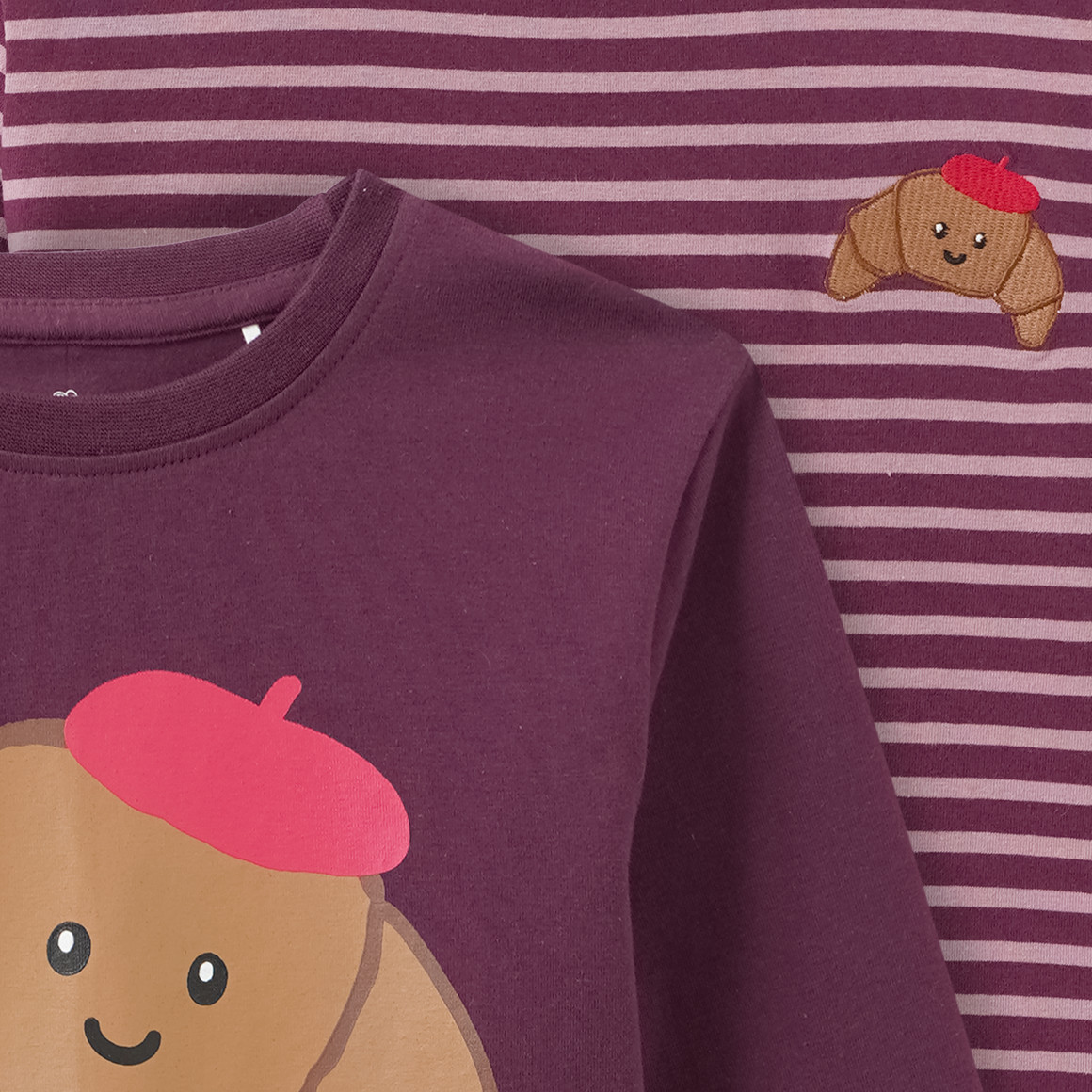 2 Mädchen Langarmshirts mit Crossaint-Motiven
