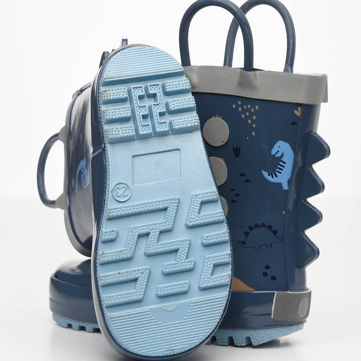 Jungen Gummistiefel mit Dino-Motiven