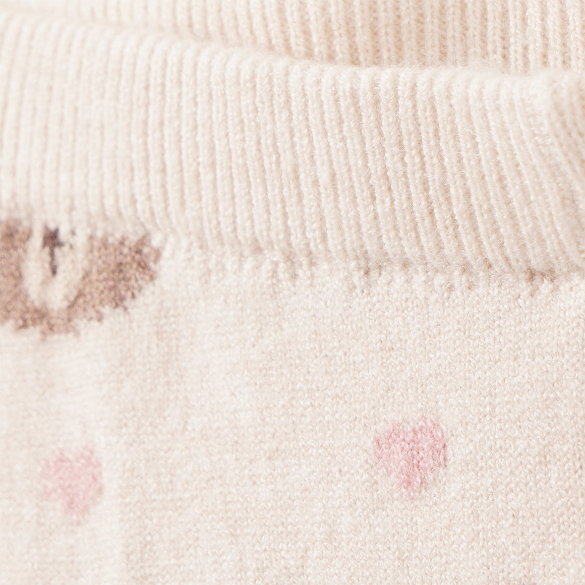 Gebreide babylegging met dierenmotieven