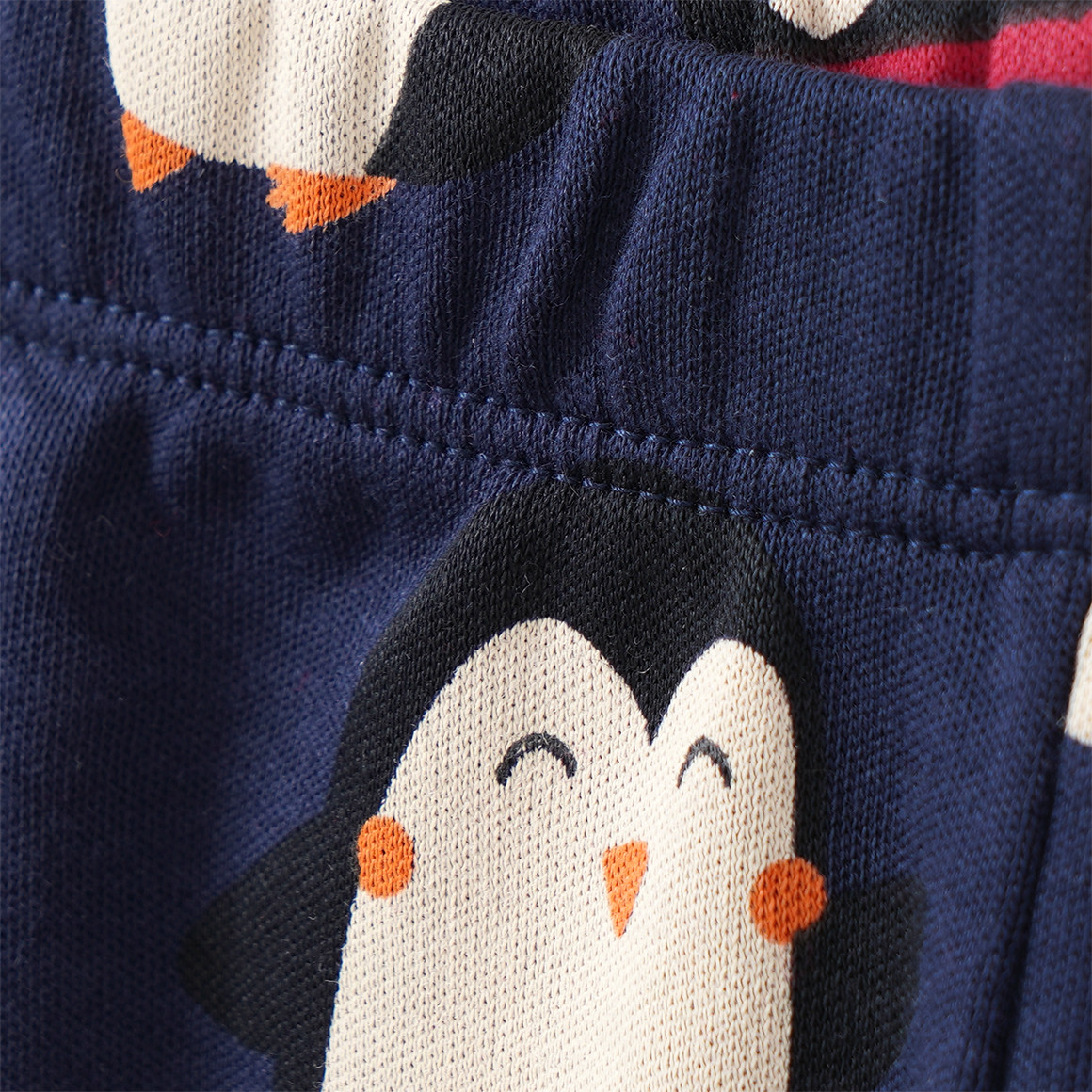 Baby Schlafanzug mit Pinguin-Applikation