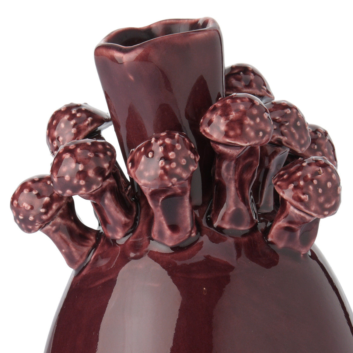 Vase mit kleinen Pilzen