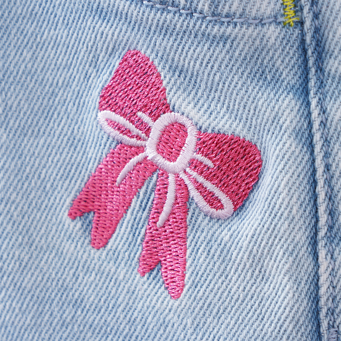 Mädchen Latzhose mit bunten Stickereien