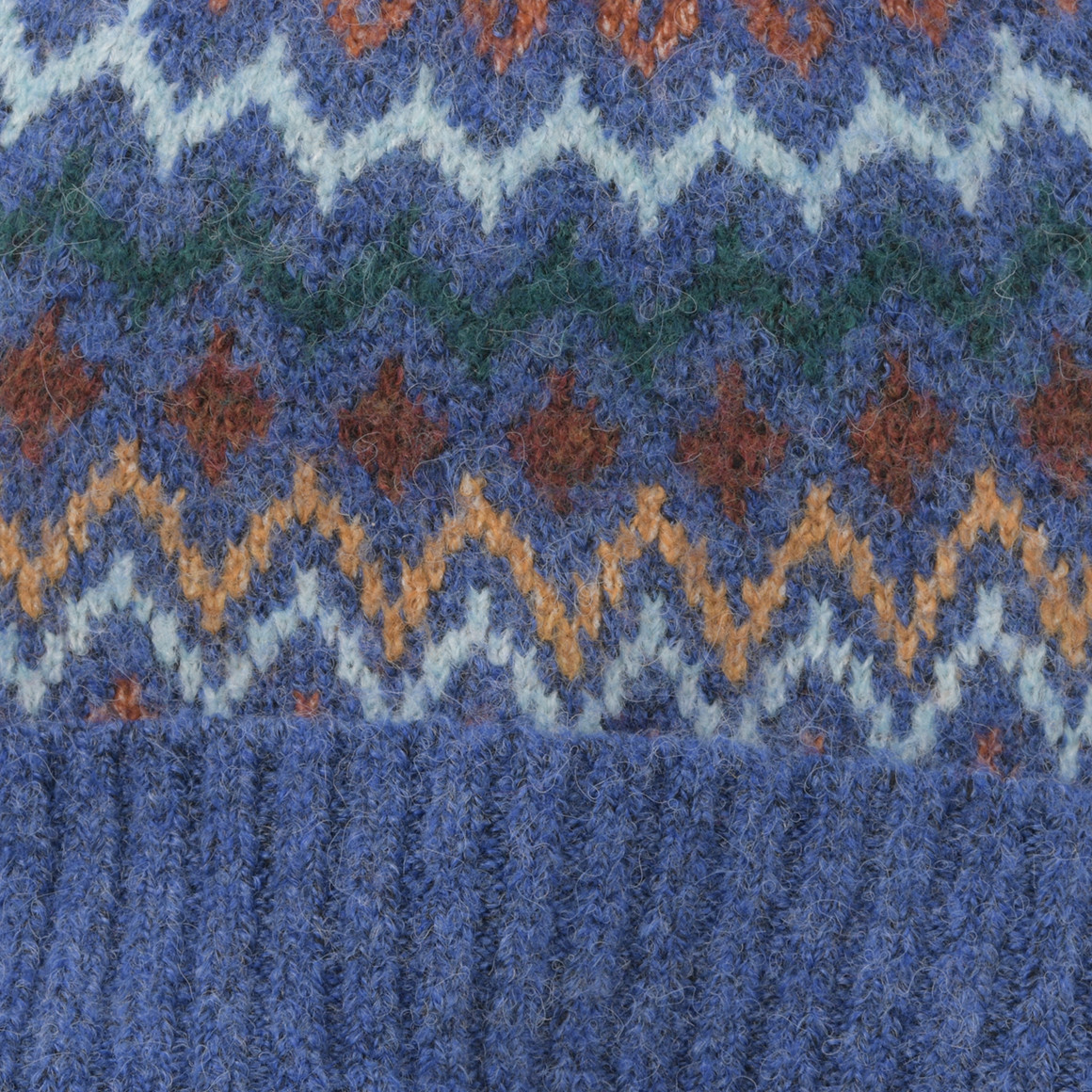 Jungen Strickmütze mit Norwegermuster