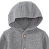 Wollen babyvest met omgeslagen boorden