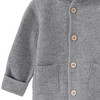 Wollen babyvest met omgeslagen boorden
