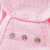 Newborn wikkelbody met gaatjespatroon