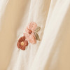 Babyjurk met bloemenstiksels
