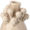 Vase mit kleinen Pilzen