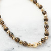 Damesketting met parels