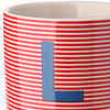 Tasse mit Buchstaben-Motiv