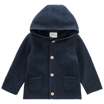 Wollen babyvest met omgeslagen boorden