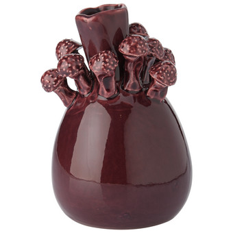 Vase mit kleinen Pilzen